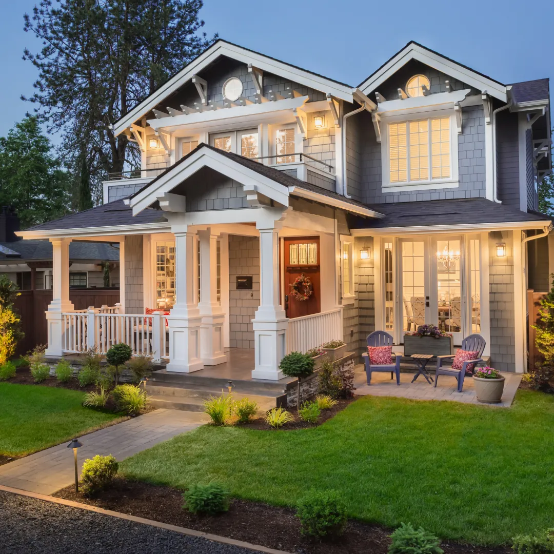 A welcoming two-story home at dusk